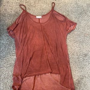 Tank with cut sleeves